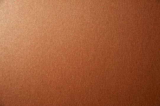 Texture Of Bronze Brown Glitter Paper Background. Macro Photo
