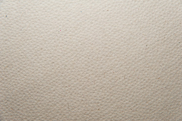 Gray paper texture - a structured dirty background. Macro photo
