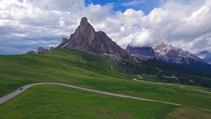 AERIAL VIEW: flight over Italian Dolomiti , camera moving forwards .