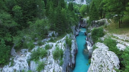 AERIAL view: flight over mountain river Soca. Camera flying forwards