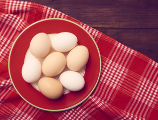 Fresh eggs over background