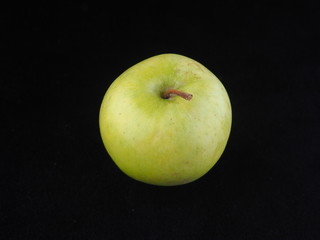 apple on a black background