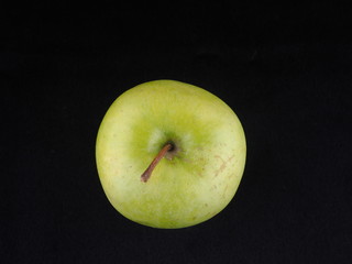 apple on a black background