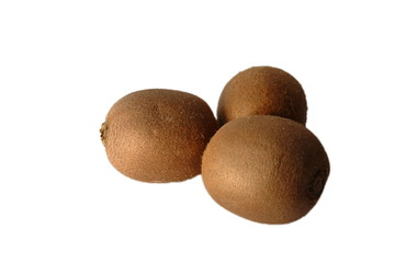 Tree fresh kiwi fruits on a white background, isolated, close up. 