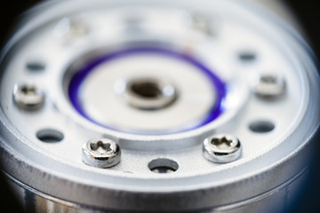 closeup inside the hard drive, spindle and torx screw