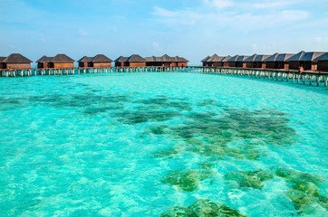 Over water bungalows on a tropical island, Maldives