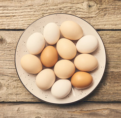 Fresh eggs over background