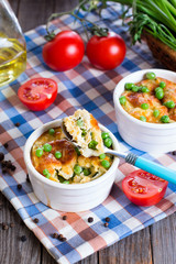 Casserole with cheese and zucchini in baking dish