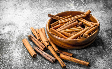 Sticks of cinnamon in a bowl.