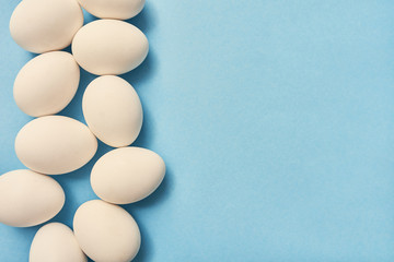 Fresh eggs over background