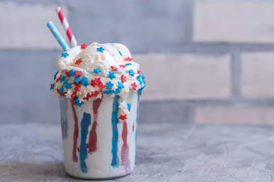 Vanilla funfetti milkshake with ice cream. Patriotic drink cocktail