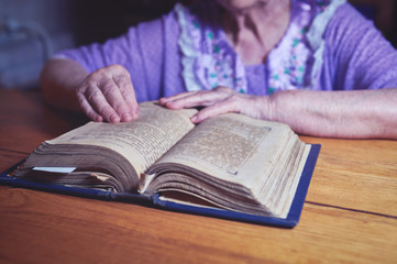 Senior woman reading a book.