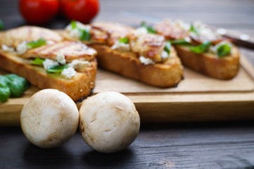 Champignons over food background, delicious mushroom recipe
