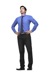 Happy asian businessman standing with hands on waist