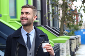 Energetic businessman showing a positive emotion