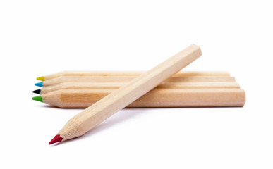 Obraz premium Wooden colorful ordinary pencils isolated on a white background 
