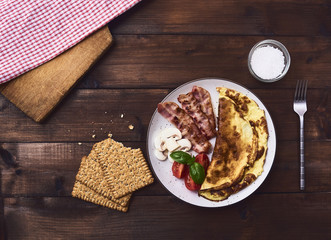 Tasty omelette in plate