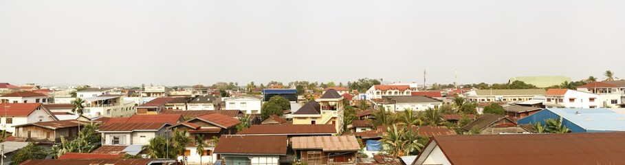 Obraz premium panoramic view of a typical southeast asian town, with temples and iron roofs, Laos, Southeast Asia