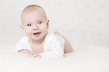 Baby Crawling on White Carpet, Happy Little Kid Portrait, Smiling Infant Child Boy in Bed