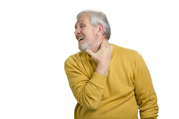 Old man having neck pain. Feeling pain, neck disease. White isolated background.