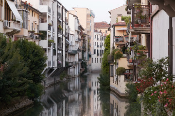 Obraz premium Padova, Italy - August 24, 2017: - Buildings facing the river in Padova downtown.