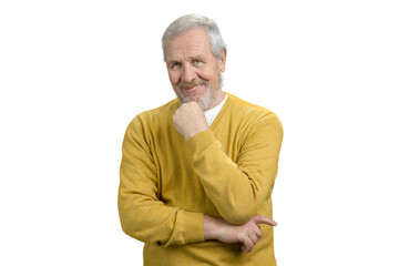 Portrait of handsome grandpa. Nice old man in yellow sweater. White isolated background.