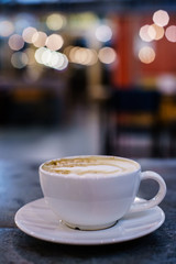 Coffee Milk and Foam with Bokeh Background