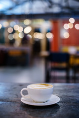 Coffee Milk and Foam with Bokeh Background