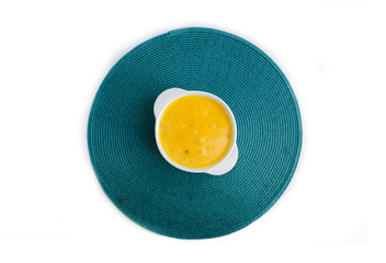 A plate of soup on a white background.napkin. isolated