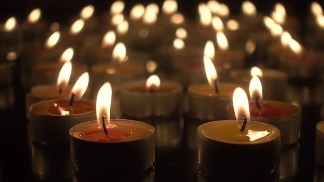 Burning candles in the dark - Cinemagraph, seamless loop