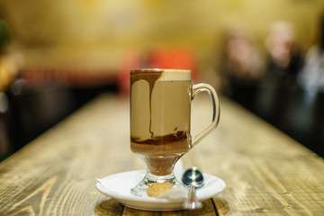 Americano Caffe with wooden background