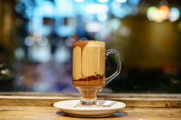 Americano Caffe with wooden background