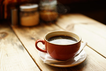 Americano Caffe with wooden background