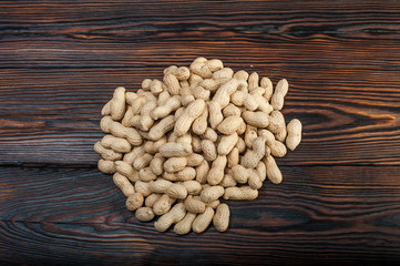 peanuts on wood background