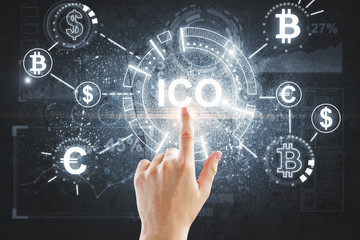 Obraz premium Hand pointing at ICO backdrop
