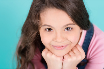 Pretty young girl with long hair smile