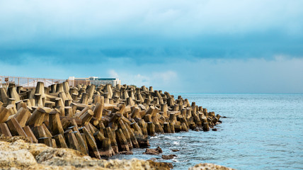 The stone installation on the shore of the ocean