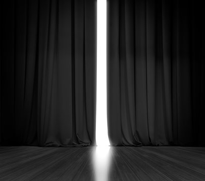 Black curtain background with bright light behind