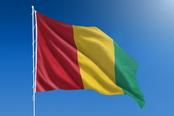 Guinea flag and blue sky