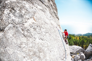 A rock climber on a rock.