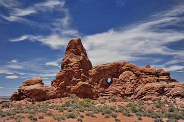 Fototapeta na wymiar USA. Natural arch of red stone in Utah