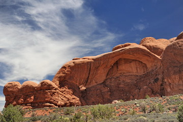 USA. Natural arch of red stone in Utah