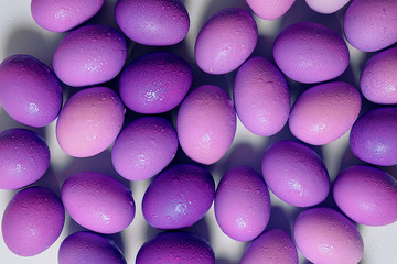 Ultraviolet a bunch of eggs lying on a white background