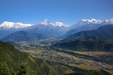 View from Sarangkot towards the Annapurna Conservation Area & the Annapurna range of the Himalayas,...