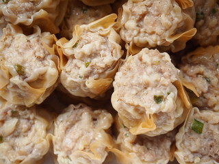 Pork Shumai, Close up a steamed dish to enjoy the sweet tenderness of pork and spices. Dim sum.