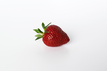 The strawberry isolated over white