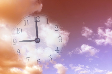 Fototapeta na wymiar Clock with sky and cloud. Vintage style background.