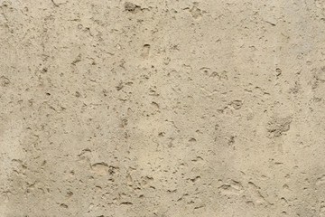 Texture of concrete with large and small holes for the background