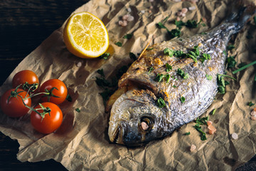 Gilthead seabream (Sparus aurata) baked in the oven.