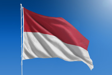 Fototapeta na wymiar Indonesia flag on a clear blue sky